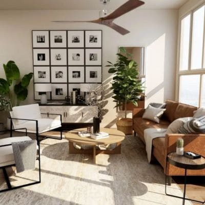Salon lumineux avec ventilateur plafond au design moderne, canapés et plantes d’intérieur, ambiance calme et chaleureuse. Ventilateur plafond silencieux efficace possible.